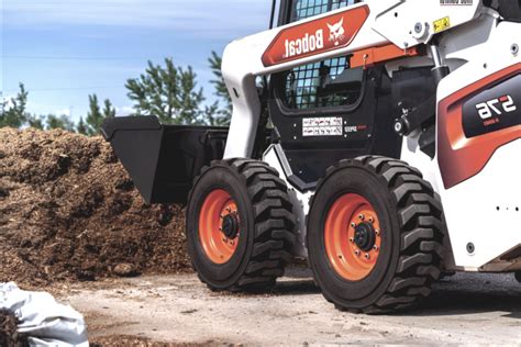 skid steer tire vs track|track vs wheeled skid steer.